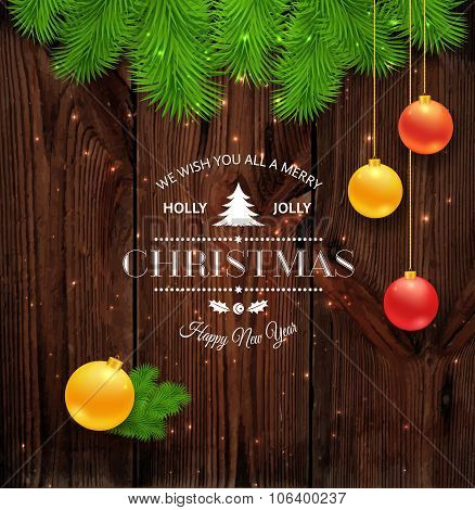 Merry Christmas greetings logo on wood.
