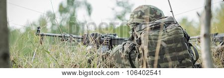Uniformed Soldier On Ground