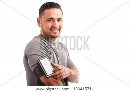 Latin Athlete Finding His Favorite Playlist