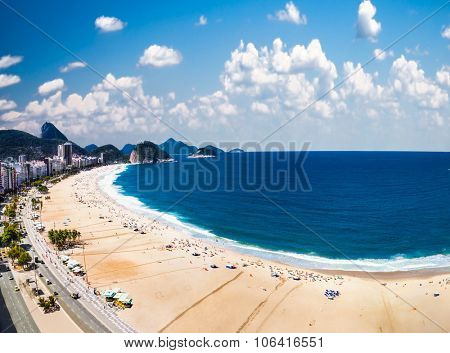 Panoramic view on Copacabana beach with city skyline of Rio de Janeiro, Brazil.
