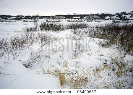 Winter Landscape On A River Basin.