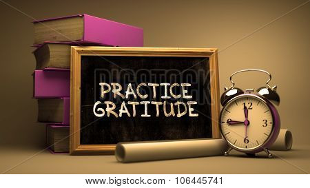 Practice Gratitude Handwritten on a Blackboard.