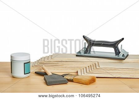 Sandpaper Holder, Stack Of Veneers And Paint Brushes
