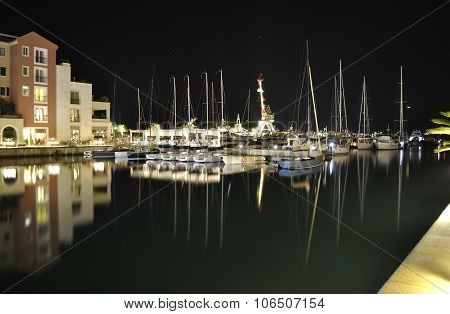 Evening embankment with reflection in Porto Montenegro.