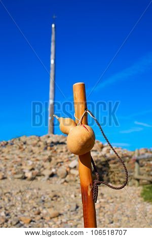 Cruz de Ferro at Saint James Way pilgrim staff and pumpkin Leon Spain