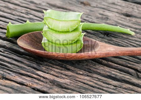 Aloe Vera Slice Natural Spas Ingredients For Skin Care On Wooden Background.