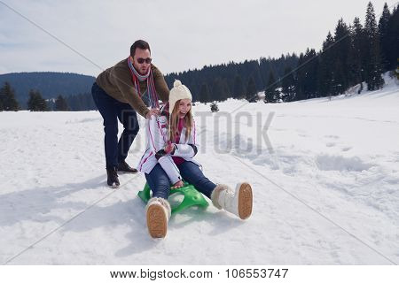 romantic winter  scene, happy young couple having fun on fresh show on winter vacatio, mountain nature landscape