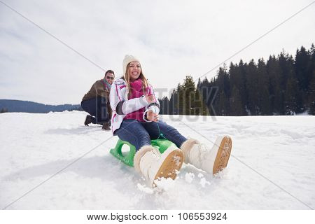 romantic winter  scene, happy young couple having fun on fresh show on winter vacatio, mountain nature landscape