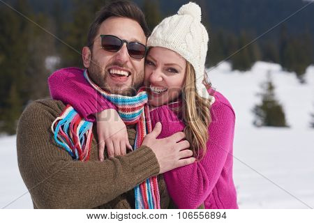 portrait of happy young romantic tourist  couple outdoor in nature at winter vacation