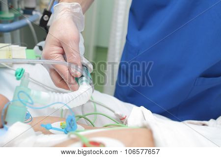 Doctor Works With Patient In The Intensive Care Unit
