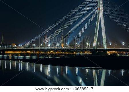 Cable-stayed bridge and River Daugava at night, Riga, Latvia