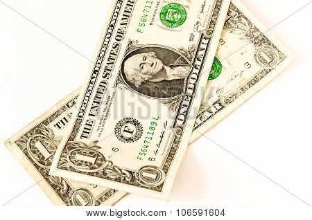 Two Usa Dollars Lay Over White