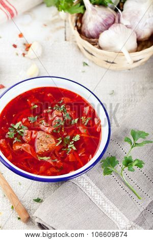 Traditional Ukrainian Russian vegetable soup, borsch with garlic donuts, pampushki.