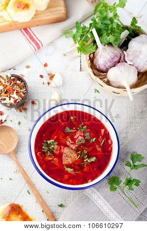 Traditional Ukrainian Russian vegetable soup, borsch with garlic donuts, pampushki.