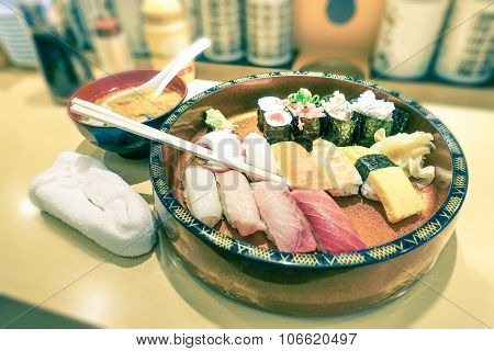 Original Plate Of Nigiri At Japanese Restaurant In Tokyo City - Vintage Filtered Look