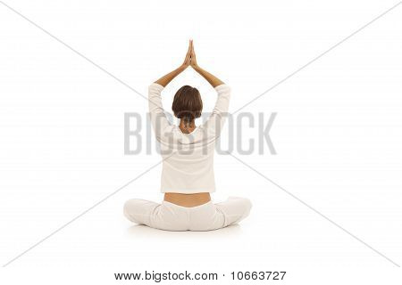 Giovane donna facendo yoga