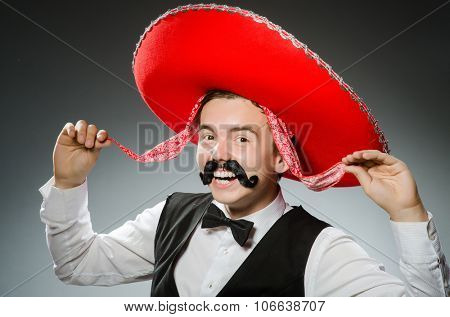 Person wearing sombrero hat in funny concept