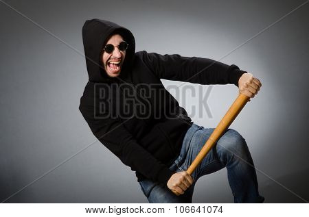 Aggressive man with basebal bat 