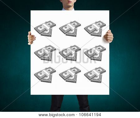 Businessman holding banner with drawn money earning concept