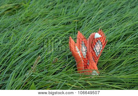 Beautifull Orange Origami Swan On A Grass