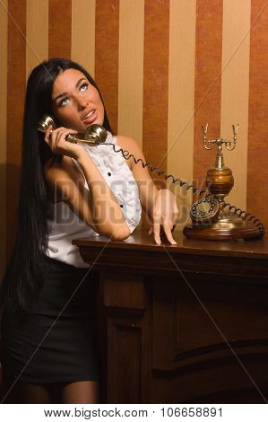 Pretty Girl Talking On Retro Telephone