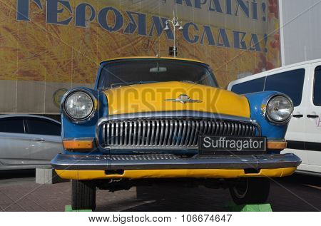 KIEV , UKRAINE - NOV 1, 2015. Exterior of the vintage Soviet car GAZ-21 Volga with folk stile tuning on November 1, 2015 in Kiev, Ukraine