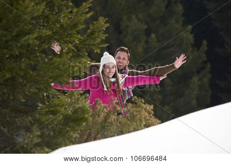 portrait of happy young romantic tourist  couple outdoor in nature at winter vacation