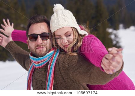 portrait of happy young romantic tourist  couple outdoor in nature at winter vacation