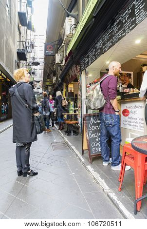 Customers outside a cafe in Melbourne