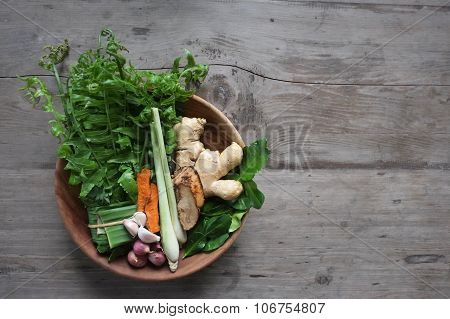asian spices in wood bowl