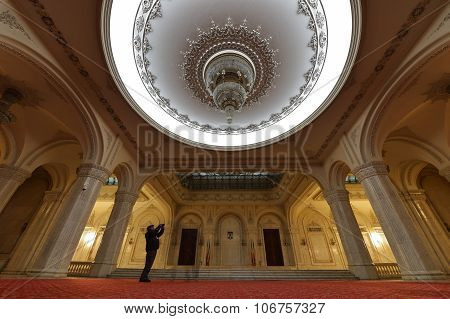 Tourist Visiting Palace Of Parliament In Romania