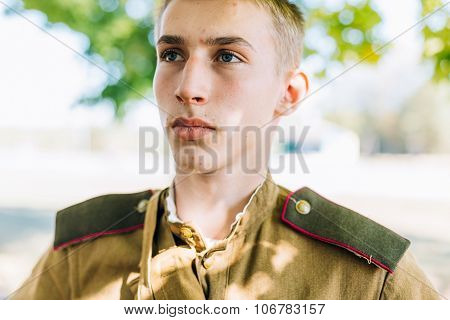 Close up of young unidentified re-enactor dressed as Soviet sol