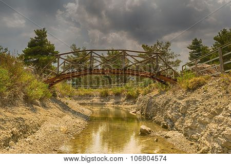 Pretty little bridge in Beletsi lake in Greece.