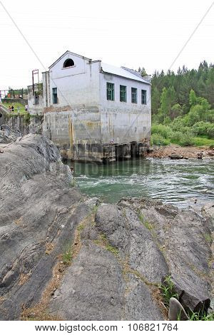 Siberia, Russia - June 11, 2012: The Old Hydroelectric Power Station On The River Chemal In Altai Mo