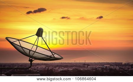 Satellite Dish In The City On Sunset.