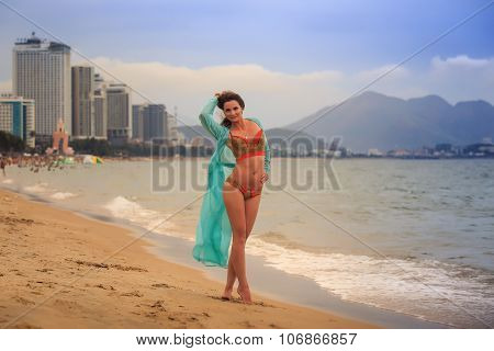 Girl In Underwear Stands On Edge Of Sea
