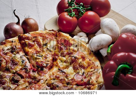 Pizza og grøntsager