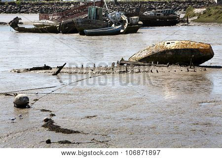 Ship Wrecks Falling Dry At Low Tide In Noirmoutier