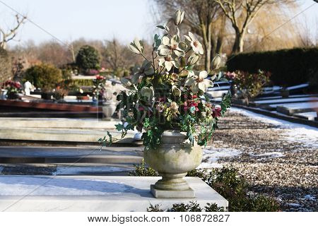 Artificial Flowers On A Grave