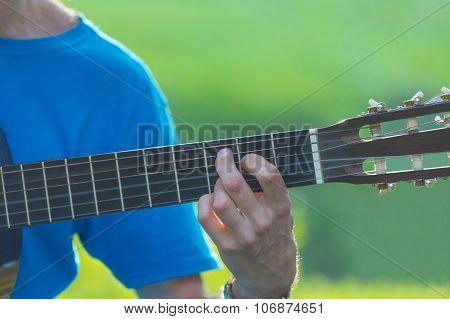 Man Playing Acoustic Guitar.
