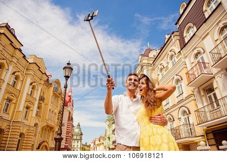 Couple In Love Making Selfie Photo On Self Stick
