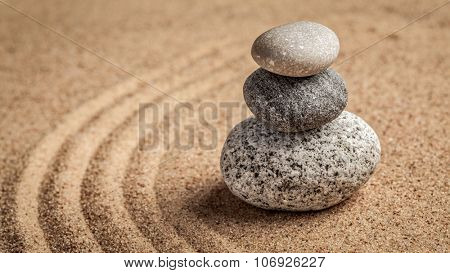 Japanese Zen stone garden - relaxation, meditation, simplicity and balance concept  - panorama of pebbles and raked sand tranquil calm scene