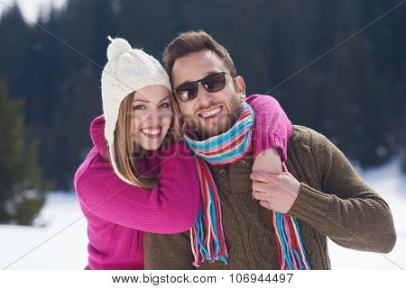 portrait of happy young romantic tourist  couple outdoor in nature at winter vacation