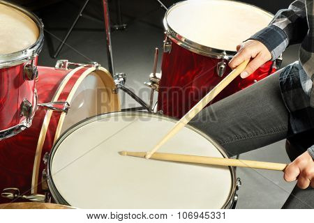 Drummer playing the drums closeup