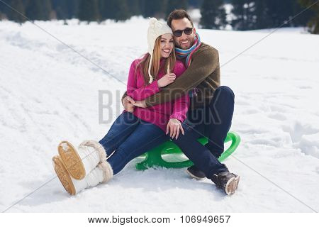 romantic winter  scene, happy young couple having fun on fresh show on winter vacatio, mountain nature landscape