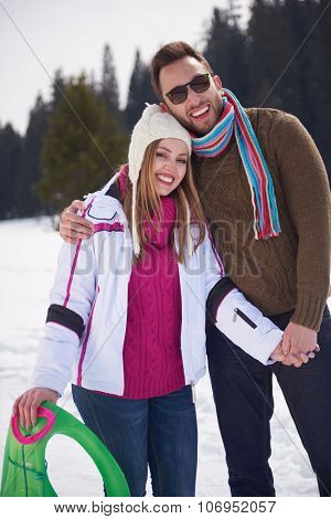 portrait of happy young romantic tourist  couple outdoor in nature at winter vacation