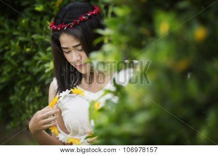 Girl with yellow flower hairband