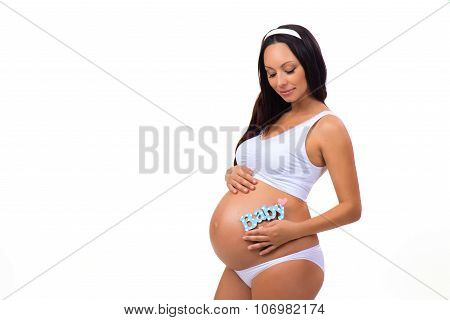 Happy Pregnancy. Pregnant Woman Waiting For The Firstborn. Blue Label 
