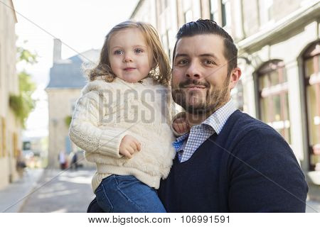Young dad with her daughter