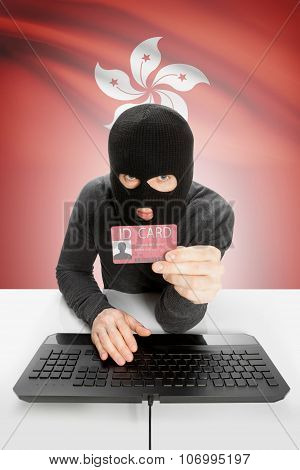 Hacker With Flag On Background Holding Id Card In Hand - Hong Kong